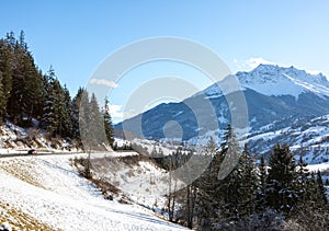 Landscape of the Engadine valley  in a sunny winter day, Graubunden canton, Swiss alps, Switzerland