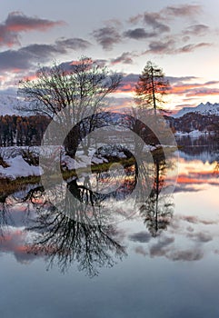 Landscape of the Engadine valley on the Swiss alps at sunset