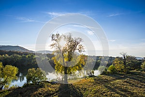 Landscape in the fall season near river