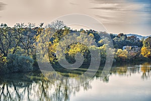 Landscape in the fall season near river