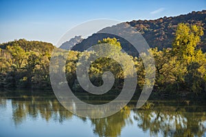 Landscape in the fall season near river