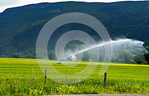 Landscape of a farm and field irrigation in Sel Norway