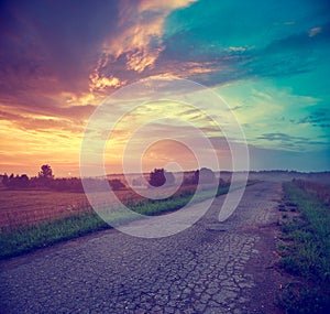 Landscape with Field and Country Road at Sunset