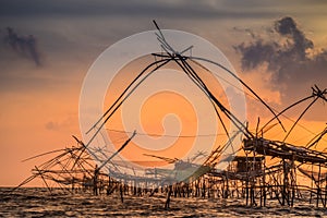 Landscape of fisherman`s village in Thailand with a number of fishing tools called photo