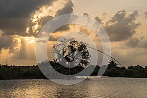 Landscape of fisherman`s village in Thailand with a number of fishing tools called photo