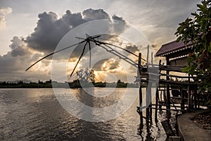 Landscape of fisherman`s village in Thailand with a number of fishing tools called photo