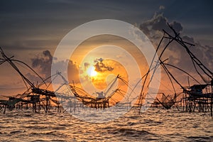 Landscape of fisherman`s village in Thailand with a number of fishing tools called photo