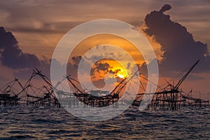 Landscape of fisherman`s village in Thailand with a number of fishing tools called photo