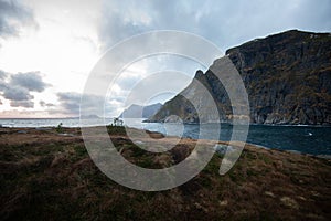 Landscape of fjord in Lofoten Norway with mountain and ocean view on time of sunset