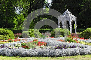 Landscape with flower beds and a gazebo