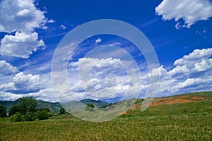 Landscape with fluffy clouds