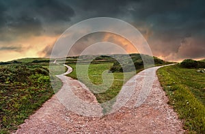 landscape of fork in the road at storm weather, concept of insecurity of future photo