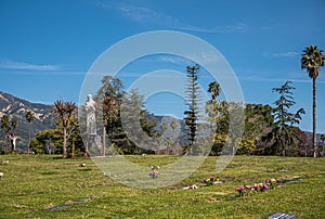 Landscape with founder statue, Calvary Cemetery. Santa Barbara, CA, USA