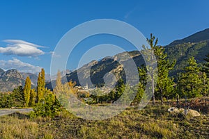 Landscape in the French southern alps in the middle of a large valley in autumn