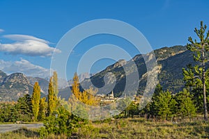 Landscape in the French southern alps in the middle of a large valley in autumn