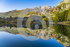 Landscape in the French southern alps in the middle of a large valley in autumn