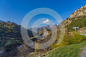 Landscape in the French southern alps in the middle of a large valley in autumn