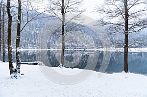 Landscape of frozen Lake Ghirla on a cold winter day, Province of Varese, Italy