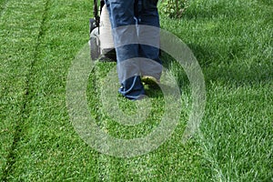 Landscape or garden service turf field or lawn mowing