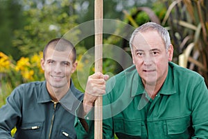 landscape gardeners looking at camera