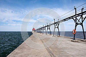 Landscape of the Grand Haven Lighthouse, pier, and catwalk, Lake Michigan, Michigan, USA