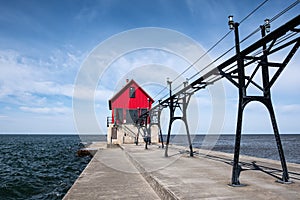 Landscape of the Grand Haven Lighthouse, pier, and catwalk, Lake Michigan, Michigan, USA