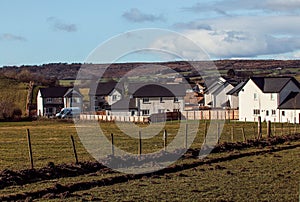 Landscape with grassland and buildings in a rural area of Lake District, England, United Kingdom