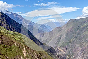 Landscape with green deep valley, Apurimac River canyon, Peruvian Andes mountains on Choquequirao trek in Peru