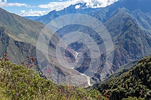 Landscape with green deep valley, Apurimac River canyon, Peruvian Andes mountains on Choquequirao trek in Peru