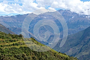 Landscape with green deep valley, Apurimac River canyon, Peruvian Andes mountains on Choquequirao trek in Peru