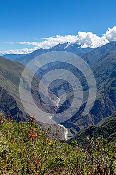 Landscape with green deep valley, Apurimac River canyon, Peruvian Andes mountains on Choquequirao trek in Peru