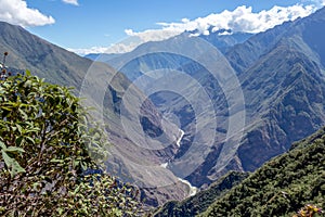 Landscape with green deep valley, Apurimac River canyon, Peruvian Andes mountains on Choquequirao trek in Peru