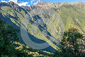 Landscape with green deep valley, Apurimac River canyon, Peruvian Andes mountains on Choquequirao trek in Peru