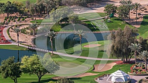 Landscape of green golf course with trees aerial timelapse. Dubai, UAE