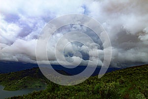 Landscape of green hills and clouds