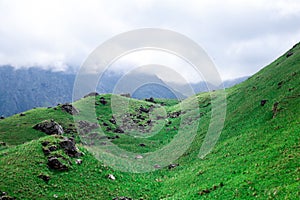 Landscape high mountains in dense fog tops of mountains in clouds North Caucasus Elbrus