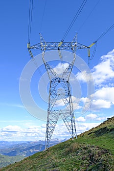 Landscape with high voltage transmission towers.