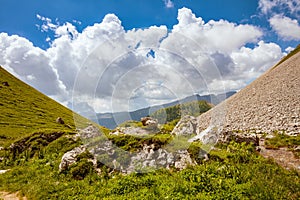 landscape with hills, clouds and rocks