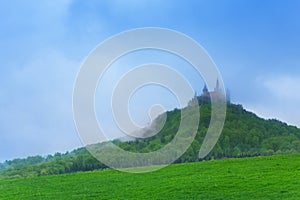 Landscape and Hohenzollern castle in haze