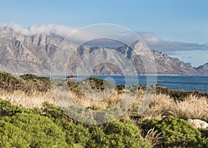 Landscape of the Hottentots Holland mountains capped with clouds