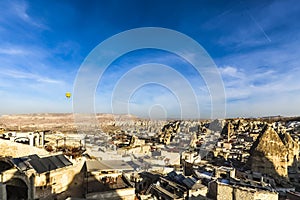 Landscape of houses and fairy chimneys at Cappadocia