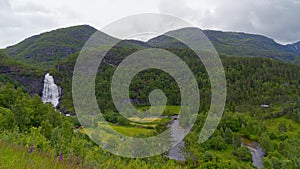 Landscape of huge Fossen Bratte waterfall Norheimsund Norway photo