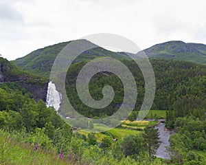 Landscape of huge Fossen Bratte waterfall Norheimsund Norway photo