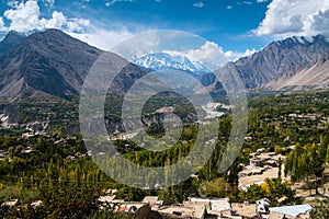 Landscape of Hunza valley and Nagar in October, separated by the river and surrounded by mountains.