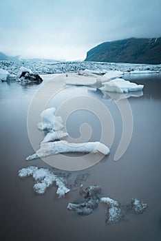 Landscape with ice floes in the glacial lake Fjallsarlon, Iceland