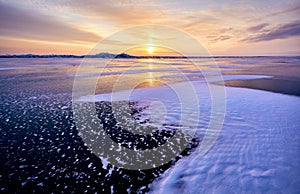 Landscape of Ice hummock and cracks at frozen lake Baikal