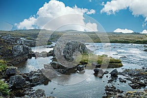 Landscape Iceland, a lake with rocks and grass