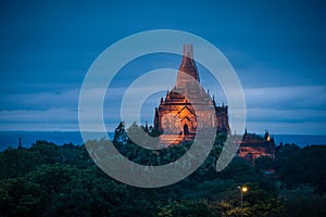 Landscape image of Ancient pagoda at sunset in Bagan