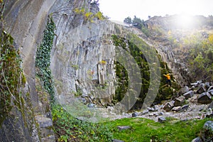 Landscape image of columnar jointing of basalt rocks and foliage in Boyabat, Sinop, Turkey, at a sunny day