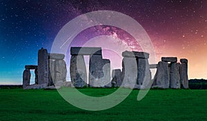 Landscape image of Milky way galaxy at night sky with stars over Stonehenge an ancient prehistoric stone monument, Wiltshire, UK